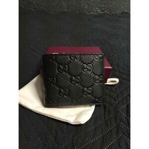 Gucci Imprint bi-fold Black wallet